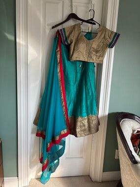Teal and Gold Women’s Lehenga with Beige Blouse